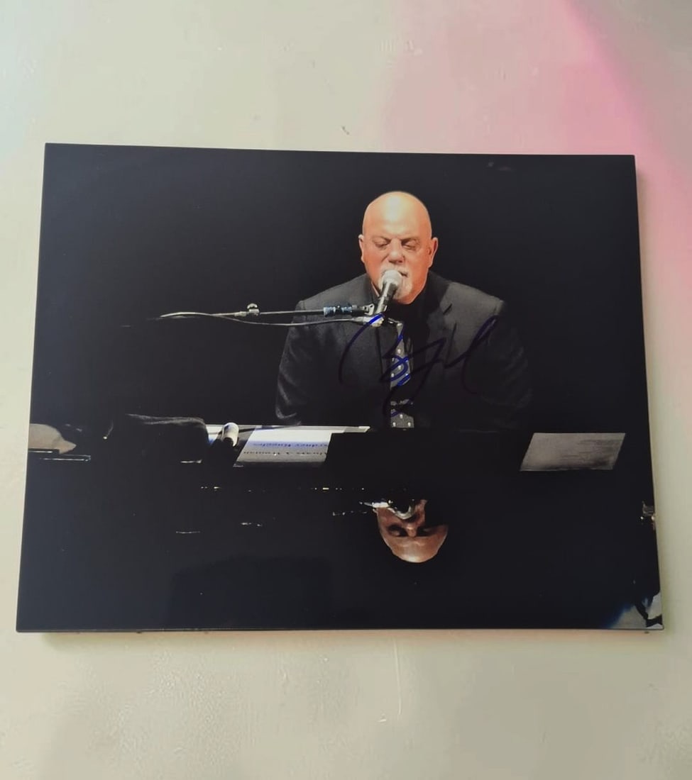 Billy Joel Signed Photograph: This lot is a photograph, autographed by Billie Joel. If you wish to upgrade to a third party authentication with holographic QR code and item scoring, an additional charge of 30 UK pound would be