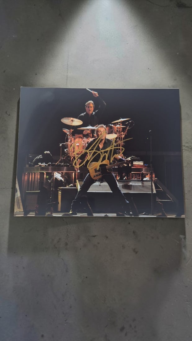 Bruce Springsteen Signed Photograph: This lot is a photograph, autographed by Bruce Springsteen. If you wish to upgrade to a third party authentication with holographic QR code and item scoring, an additional charge of 30 UK pound would 