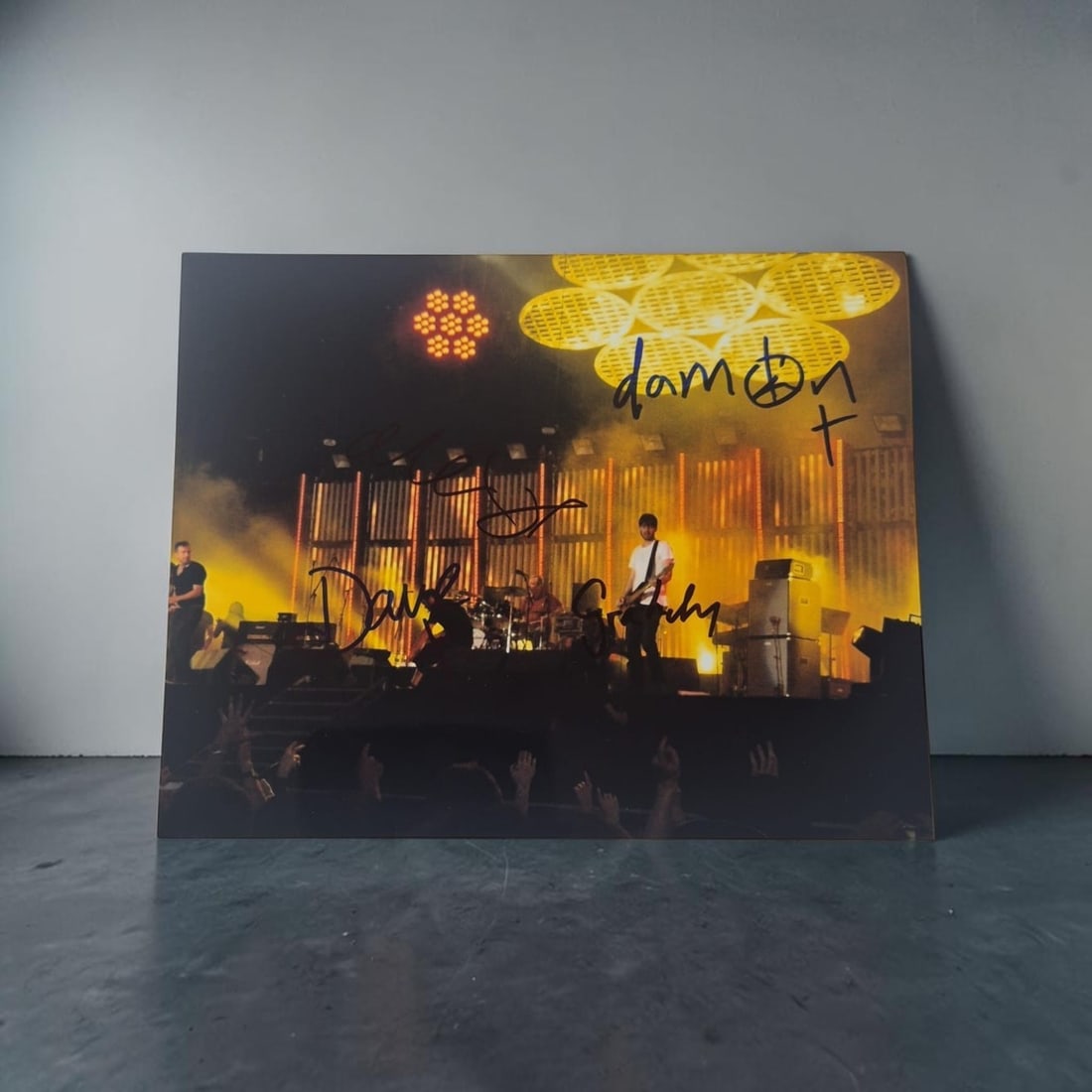 Blur Signed Photograph: This lot is a photograph, autographed by Damon Albarn, Graham Coxon, Alex James and Dave Rowntree of Blur. If you wish to upgrade to a third party authentication with holographic QR code and item scor