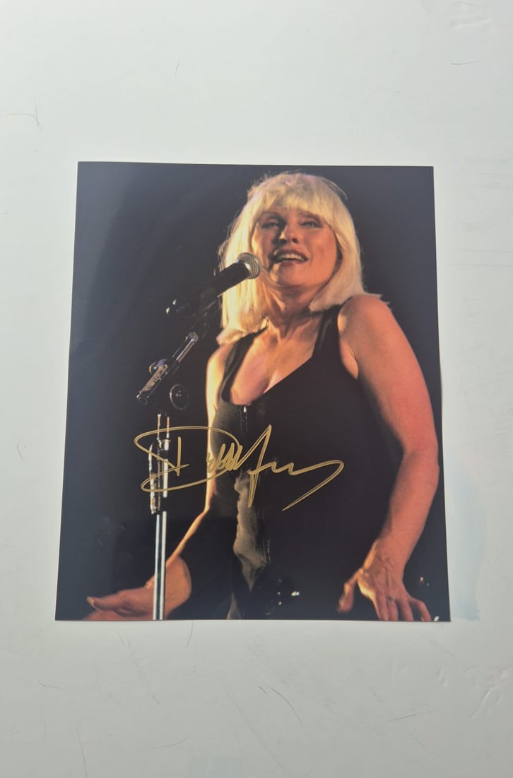 Debbie Harry Blondie Signed Photograph: This lot is a photograph, autographed by Debbie Harry of Blondie. If you wish to upgrade to a third party authentication with holographic QR code and item scoring, an additional charge of 30 UK pound 