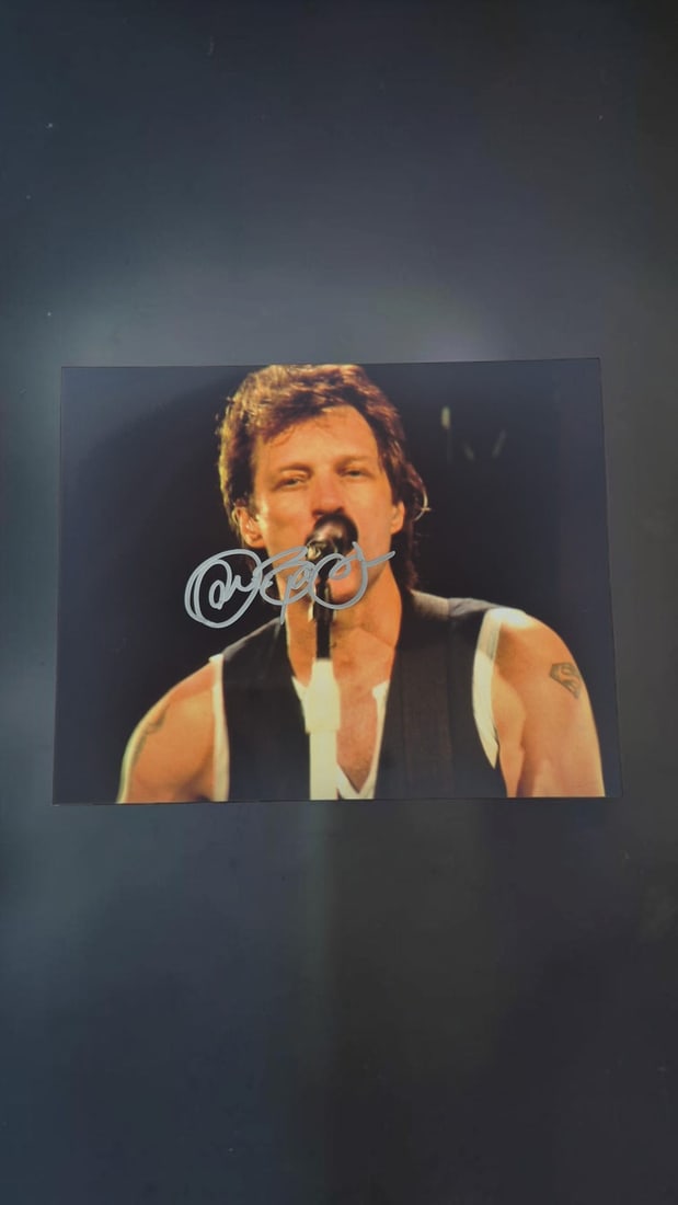 Jon Bon Jovi Bon Jovi Signed Photograph: This lot is a photograph, autographed by Jon Bon Jovi of Bon Jovi. If you wish to upgrade to a third party authentication with holographic QR code and item scoring, an additional charge of 30 UK Pound