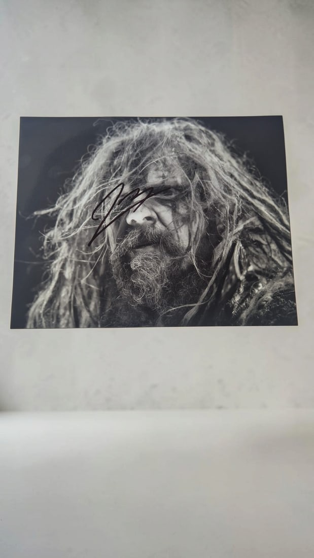 Rob Zombie Signed Photograph: This lot is a photograph, autographed by Rob Zombie. If you wish to upgrade to a third party authentication with holographic QR code and item scoring, an additional charge of 30 UK Pound would be