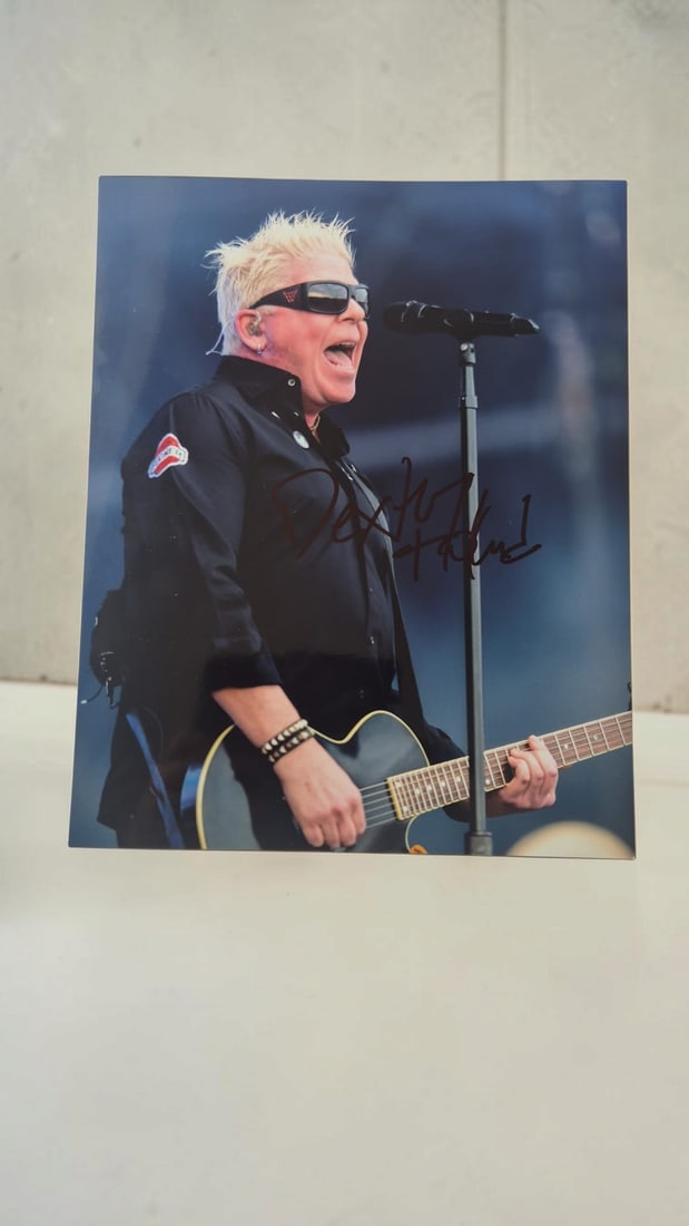 Dexter Holland The Offspring Signed Photograph: This lot is a photograph, autographed by Dexter Holland of The Offspring. If you wish to upgrade to a third party authentication with holographic QR code and item scoring, an additional charge of 30 U