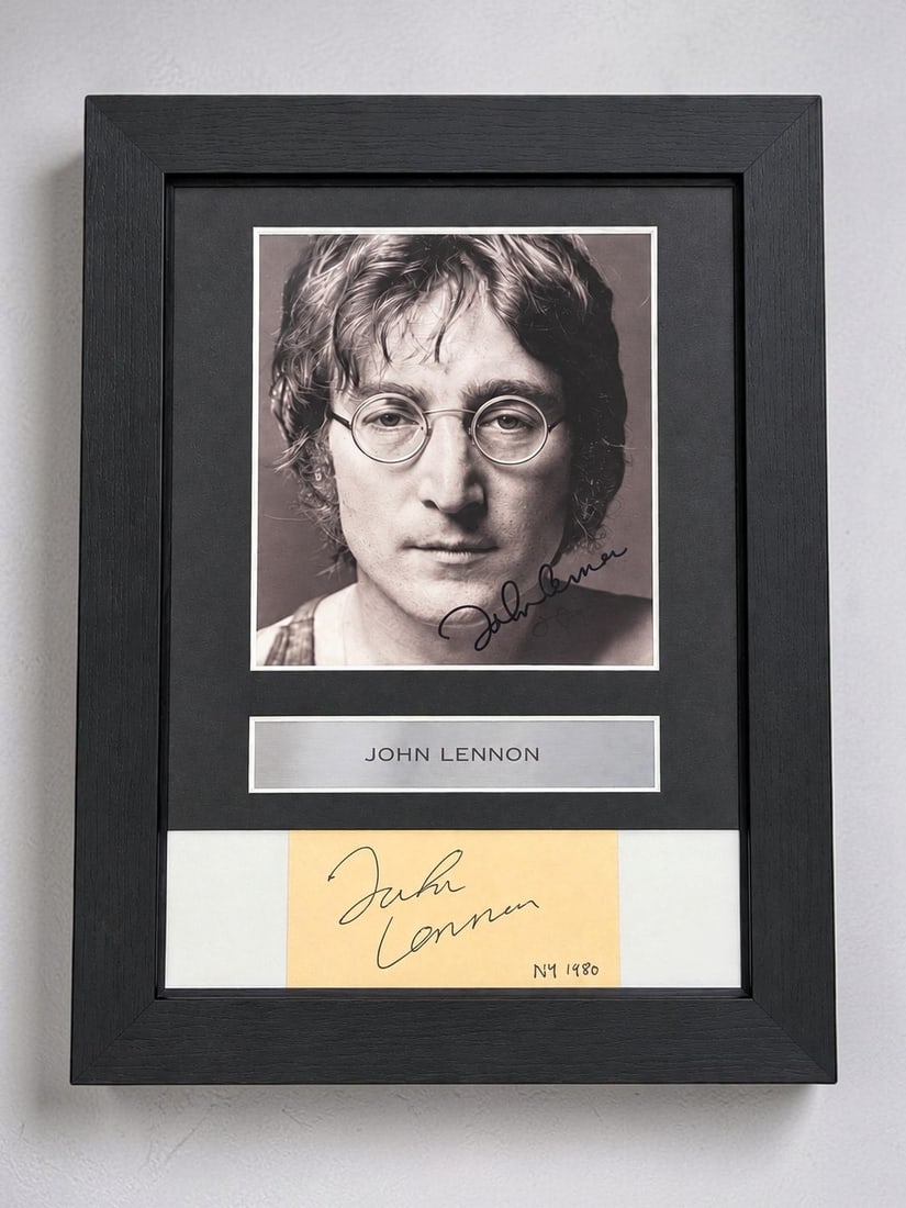 John Lennon Signed Framed Autograph Cut New York 1980: This lot is a framed autograph cut, autographed by John Lennon in New York 1980, comes with a photograph of an email from previous owner stating Roger Eppersons approval of item. If you wish to upgrad