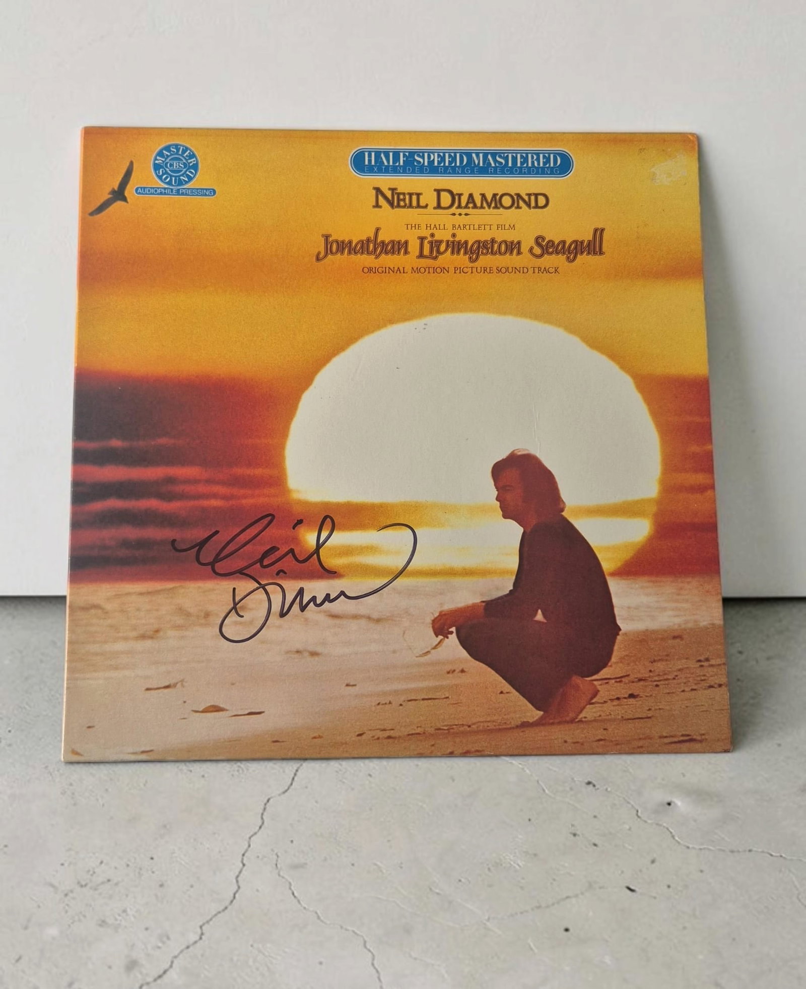 Neil Diamond Jonathan Livington Seagull Signed Vinyl LP: This lot is a vinyl LP (Jonathan Livington Seagull), autographed by Neil Diamond. If you wish to upgrade to a third party authentication with holographic QR code and item scoring, an additional charge