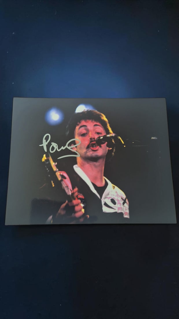 Paul McCartney The Beatles Signed Photograph: This lot is a photograph, autographed by Paul McCartney of The Beatles. If you wish to upgrade to a third party authentication with holographic QR code and item scoring, an additional charge of 30 UK 