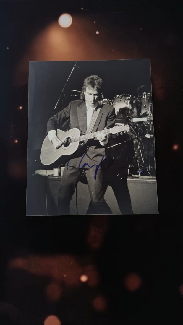 Ray Davies The Kinks Signed Photograph: This lot is a photograph, autographed by Ray Davies of The Kinks. If you wish to upgrade to a third party authentication with holographic QR code and item scoring, an additional charge of 30 UK Pound