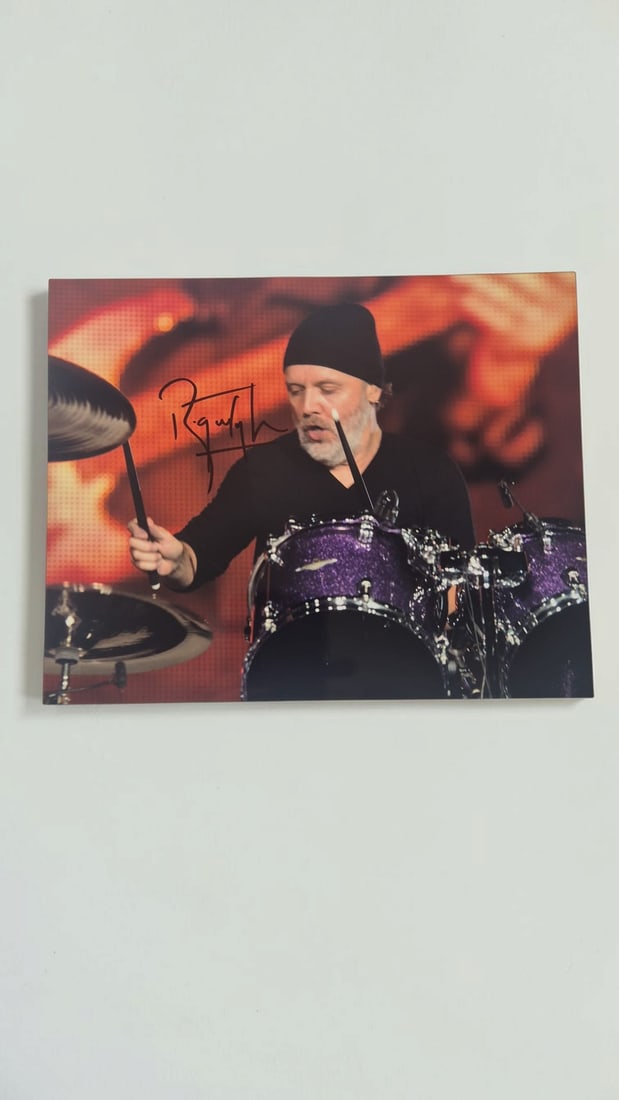 Roger Taylor Queen Signed Photograph: This lot is a photograph, autographed by Roger Taylor of Queen. If you wish to upgrade to a third party authentication with holographic QR code and item scoring, an additional charge of 30 UK Pound