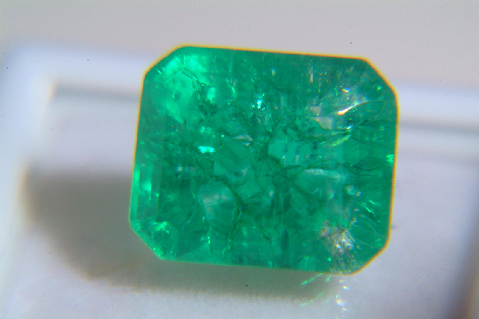 Emerald: Beryl 8.25 Ct Origin: Tanzania Color: very bright green in color VVs quality, heated Refractive Index: RI1.56-157 Other Details: M.O.silk & firth DR Dimensions: 12.92 x 10.67 x 8.05mm Estimated Price 