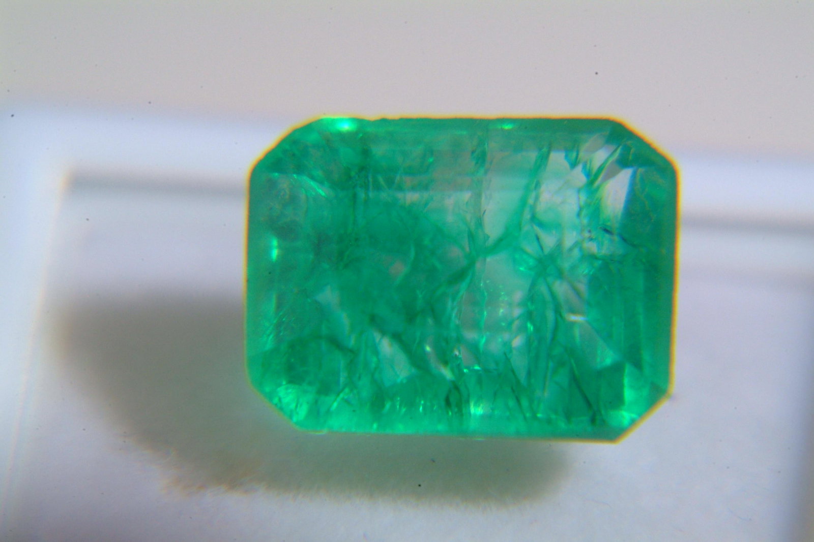 Emerald: Beryl 7.05 Ct Origin: Tanzania Color: very bright green in color VVs quality,heated Refractive Index: RI1.56-157 Other Details: M.O.silk & firth DR Dimensions: 12.79 x 9.69 x 7.45mm Estimated Price Pe