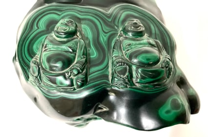Carved Malachite sculpture with buddha figures