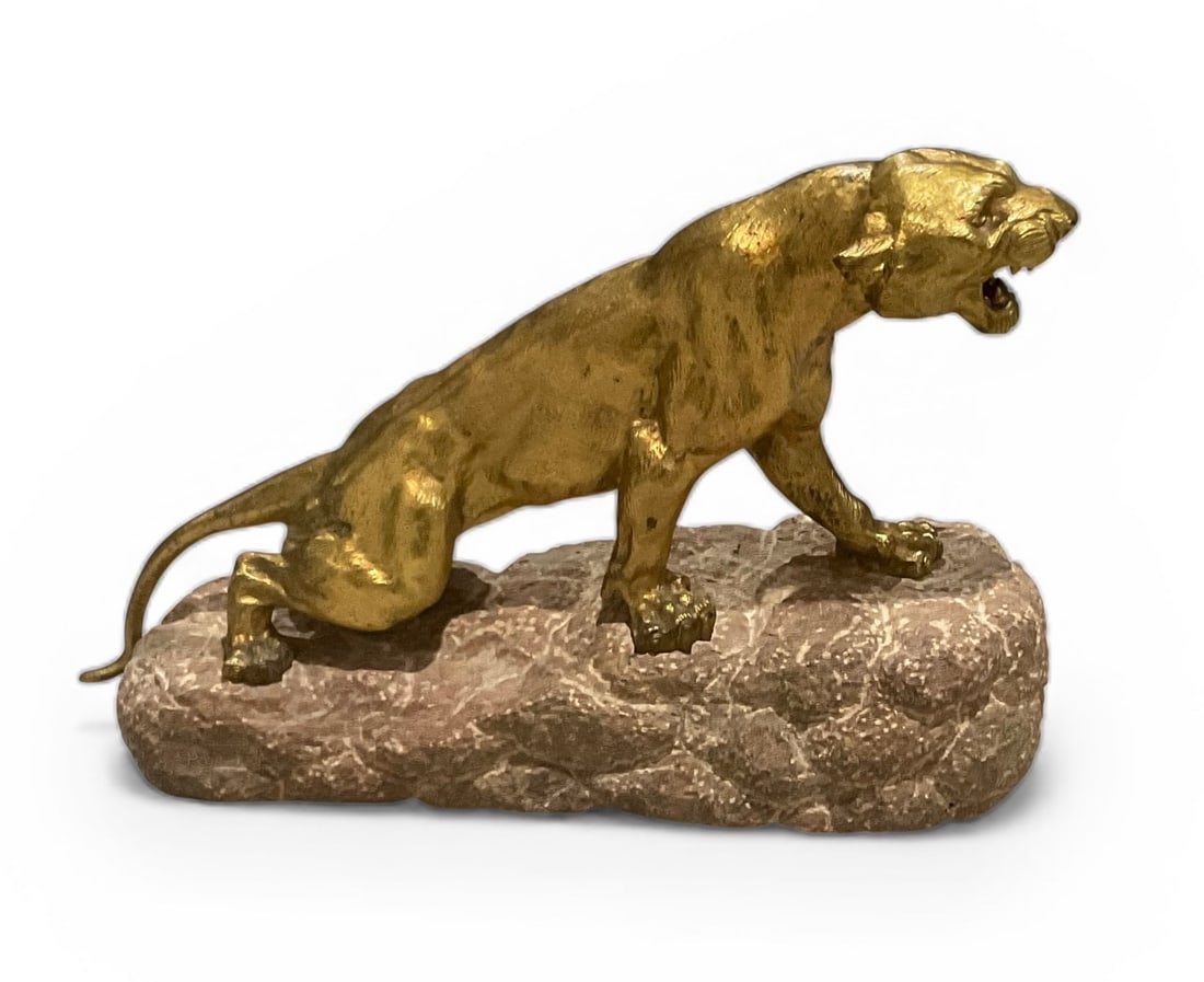 Thomas Francois Cartier (1879-1943) Large gilt bronze sculpture of a lion on marble base (1 of 5)