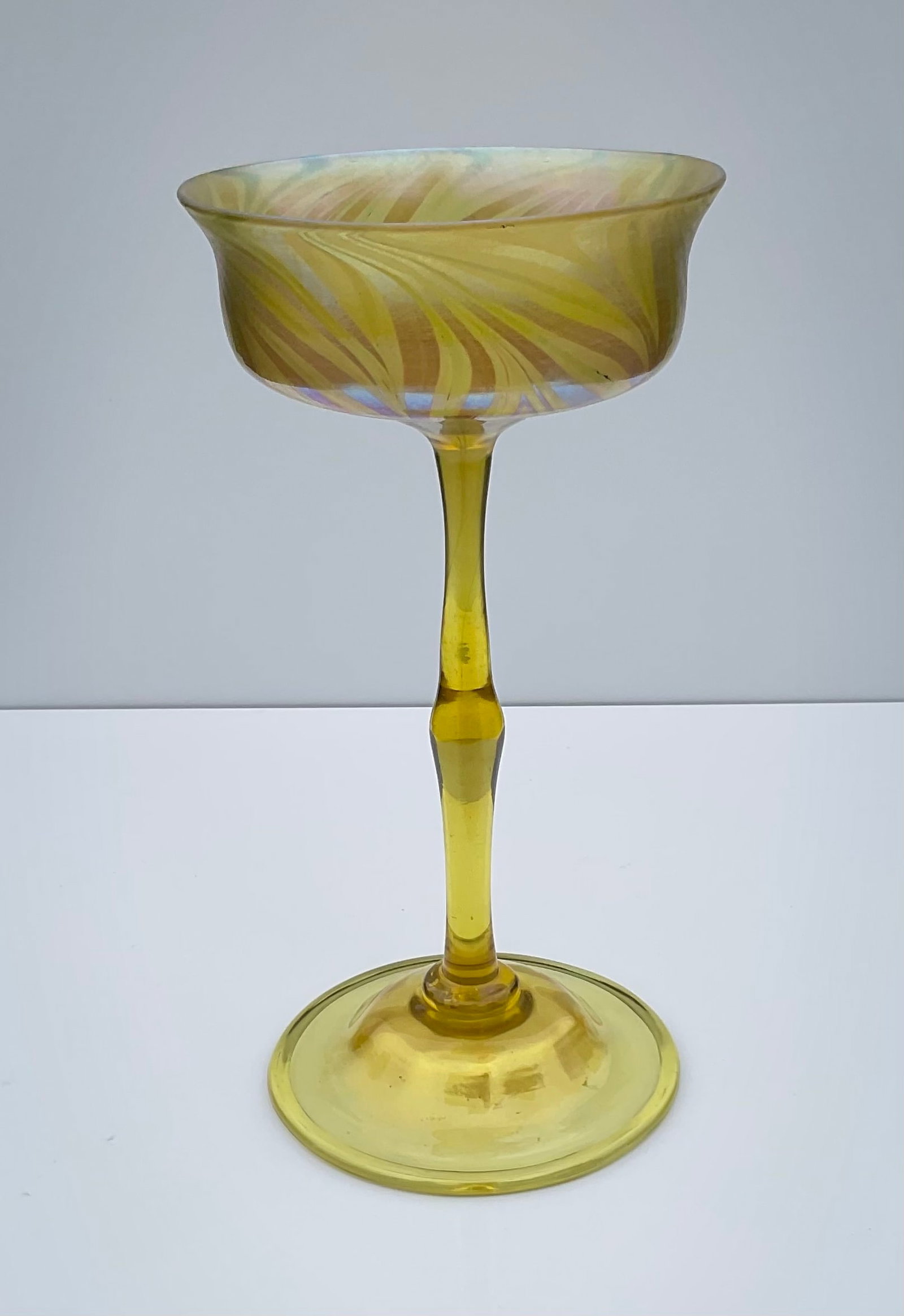 Tiffany attributed Tulip Form vase with irredescent finish: Tiffany attributed Tulip Form vase with irredescent finish. The vase is unsugned.