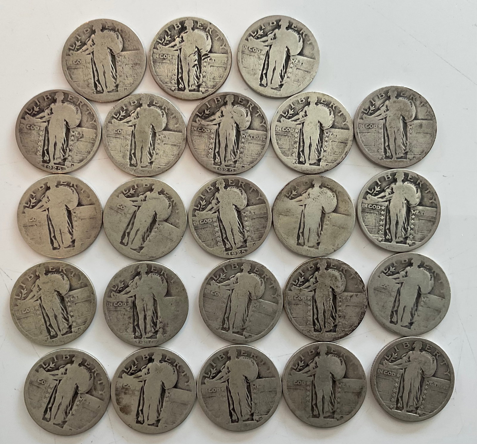 Group of 23 90 percent silver Liberty quarters: Group of 23 90 percent silver Liberty quarters