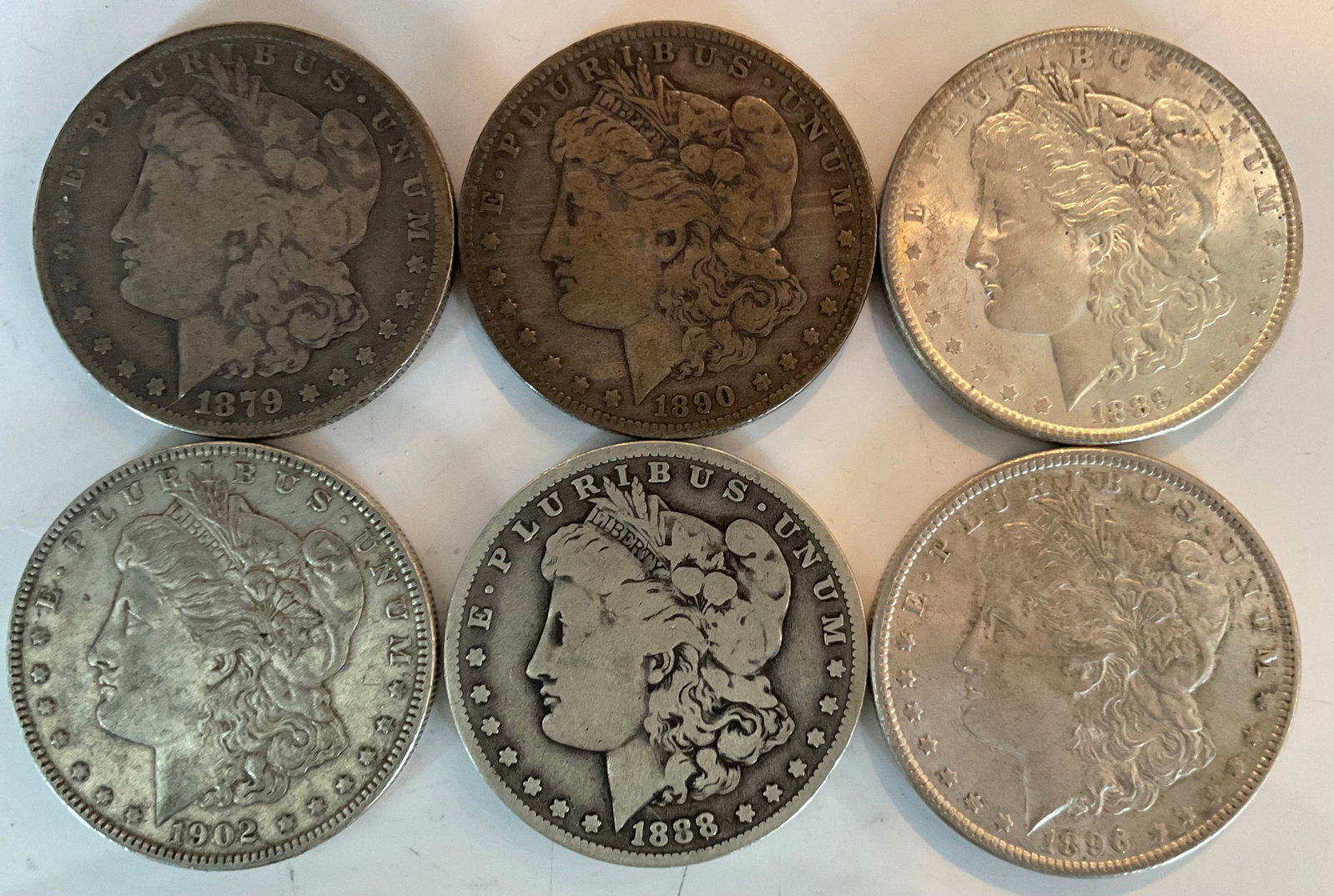 Group of six assorted Morgan Silver dollars 90 percent silver (1 of 1)