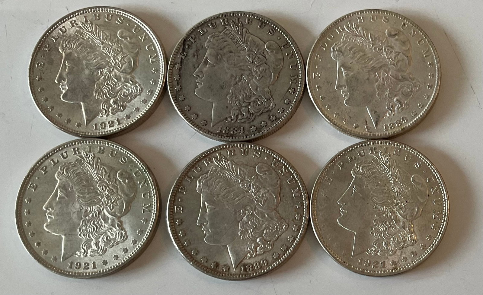 Group of six assorted Morgan Silver dollars 90 percent silver (1 of 1)