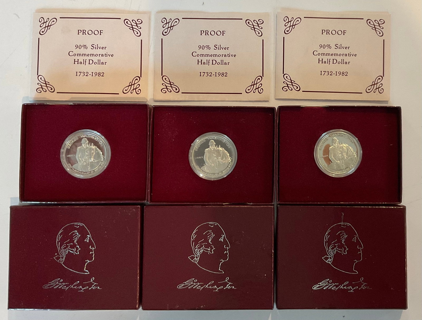 group of 3 1982 Commemorative 90 percent silver half dollars (1 of 1)