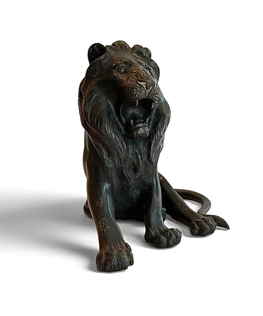 Meiji Era Japanese bronze sculpture of a lion: Meiji Era Japanese bronze sculpture of a lion. Glas eyes. Artist signature.