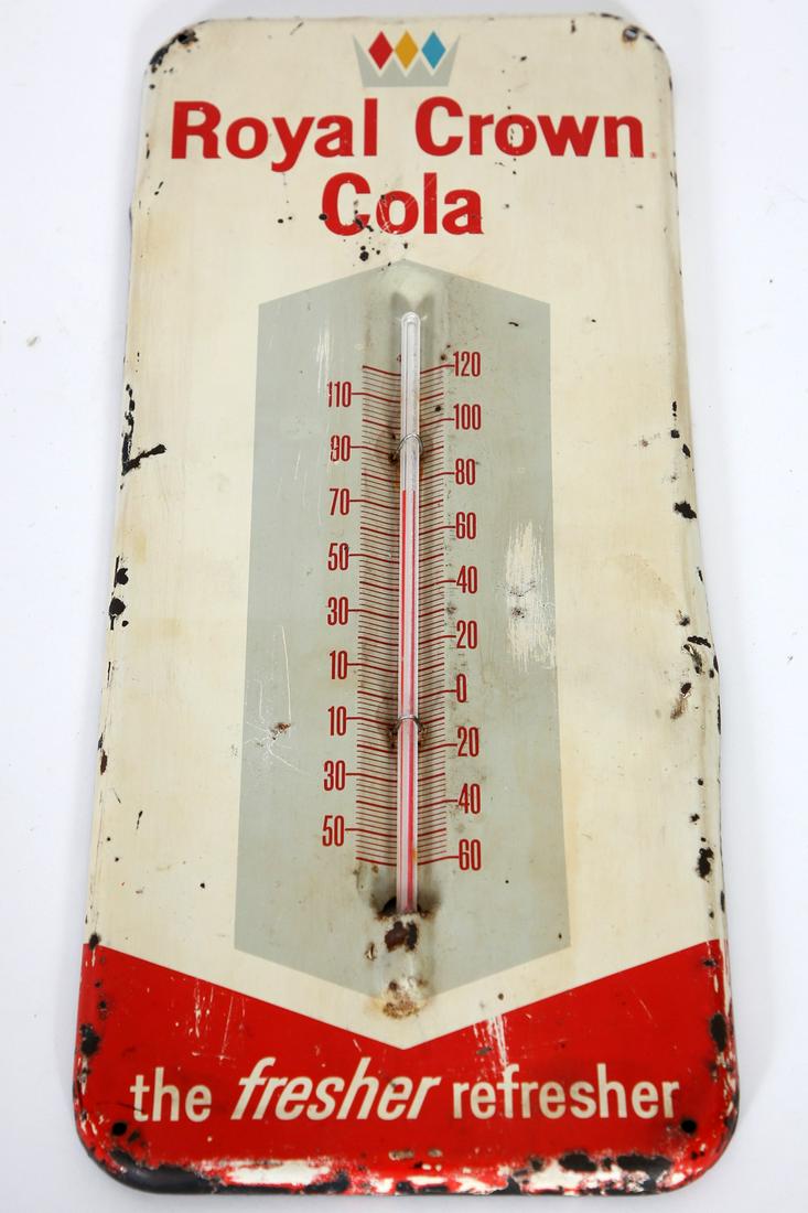 Royal Crown Cola RC Advertising Thermometer: Royal Crown Cola Advertising Thermometer. Condition: Some paint loss, scratches, indentation on right side. Size: 5 3/4" W x 13 1/2" H.