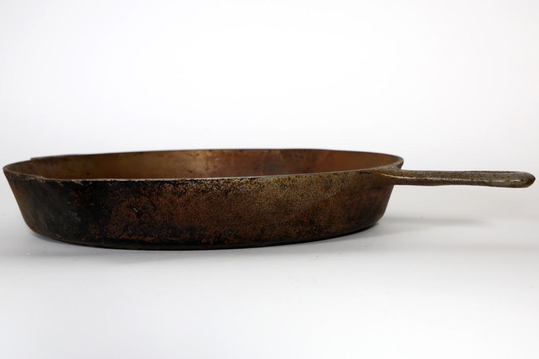 Wagner Ware 14"Cast Iron Skillet: 14" Wagner ware Cast Iron Skillet from Sidney Ohio with heat ring. Condition:Good, rust, needs cleaned. Size:14" Diameter.