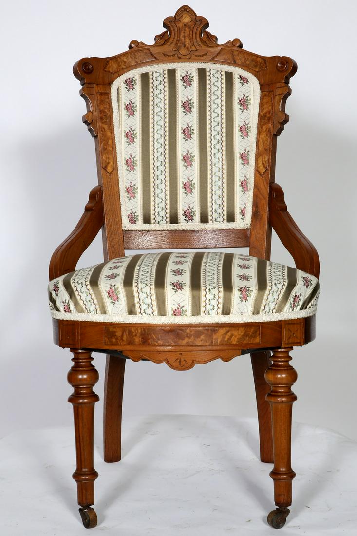 Walnut Victorian Renaissance Chair: Walnut Victorian Renaissance Chair,burled trim,turned legs,porcelain casters. Condition:Good, refinished. Size: 21" W x 18 1/2" D x 37 1/4" H