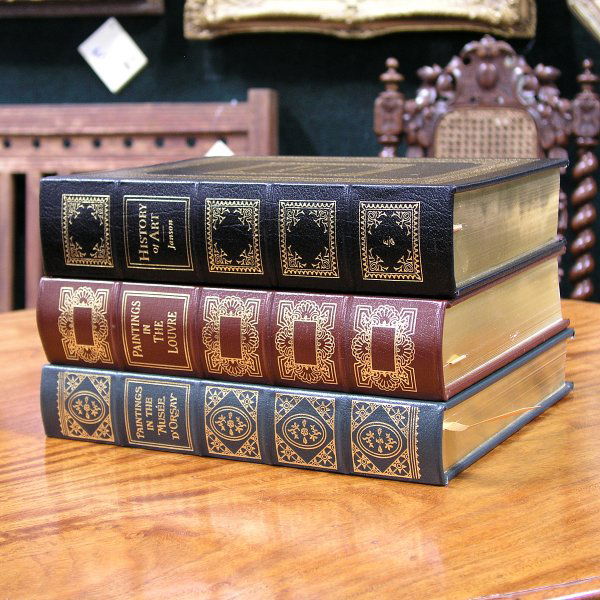 Three Leather Bound Books; "History of Art", ...: Three Leather Bound Books; "History of Art", "Le Louvre" and "Musee' D' Orsay", all with extensive photographs