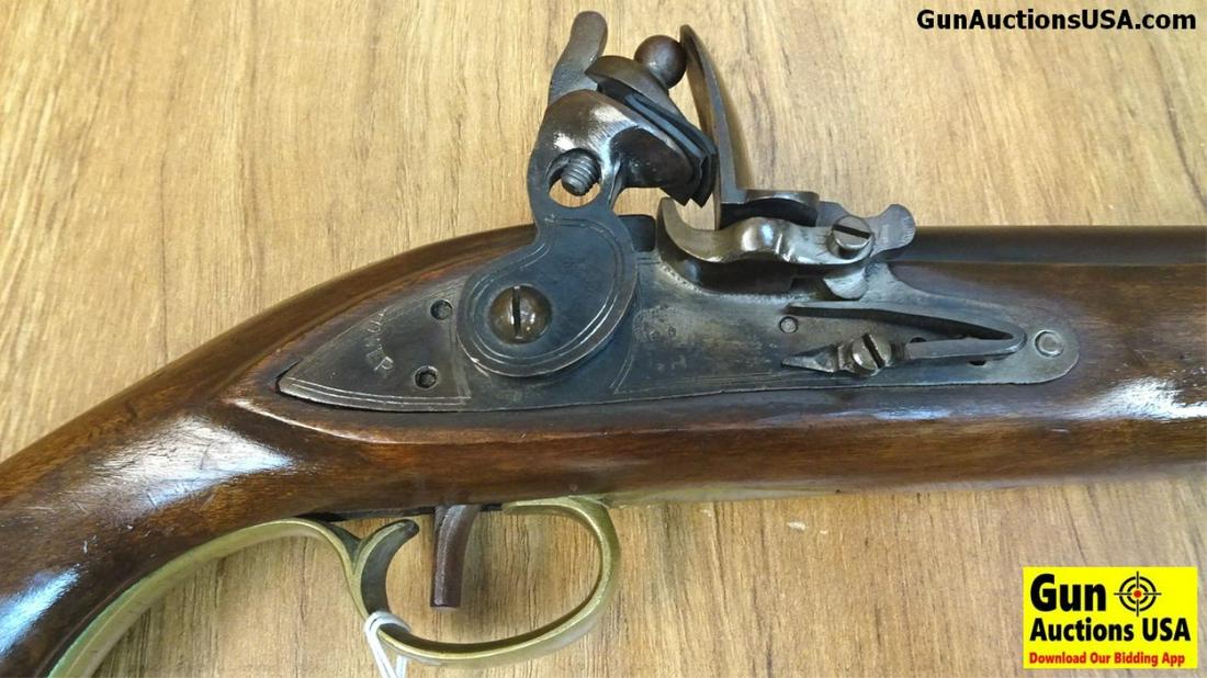 FIE Tower Pistol Single Shot Pistol. Good Condition. 9": FIE Tower Pistol Single Shot Pistol. Good Condition. 9" Barrel. A Very Nice Reproduction Tower Pistol, Flint Lock Style, Blue Barrel with Brass Embellishments, Hardwood Stocked. . SN:E457 Japan (36982