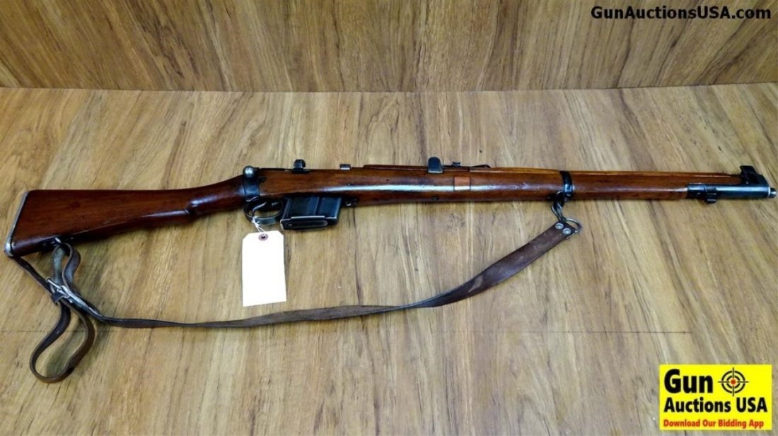 BRITISH 7.62 mm 2A1 R.F.I. 7.62 Bolt Collectors Ri: BRITISH 7.62 mm 2A1 R.F.I. 7.62 Bolt Collectors Rifle. Very Good. 25" Barrel. Shootable Bore, Tight Action This Old War Horse Retains its Correct Military Sights with Protective Ears, Stock has a Uniq