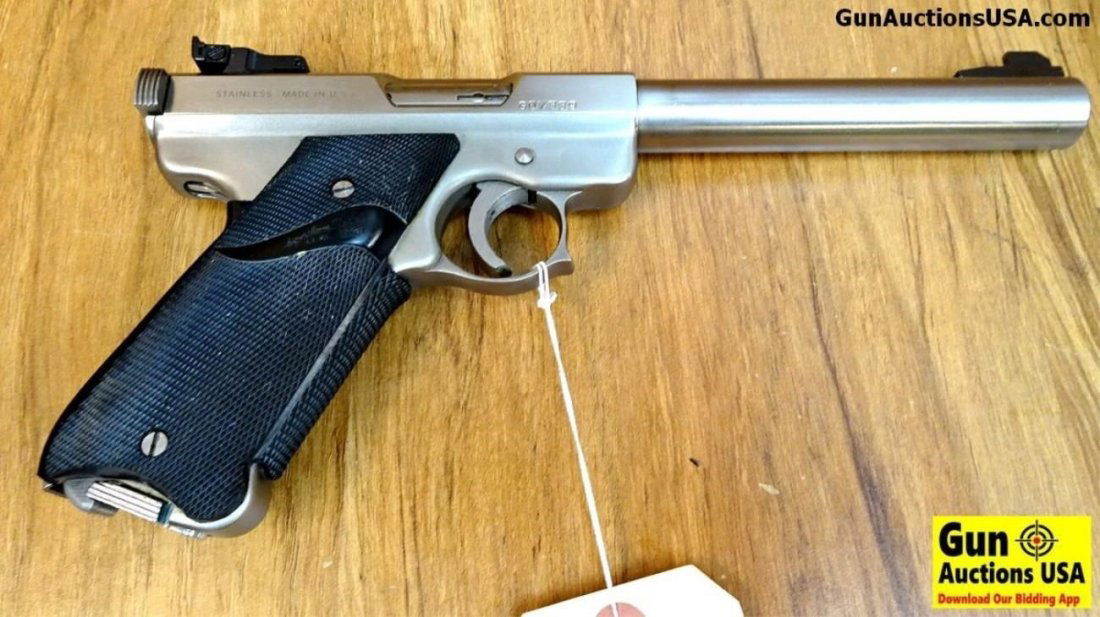 AMT LIGHTNING .22 LR Semi Auto Pistol. Very Good.: AMT LIGHTNING .22 LR Semi Auto Pistol. Very Good. 6.5" Barrel. Shiny Bore, Tight Action Patterned after a MARK1 Ruger, This AMT Lightning came with Millet Adjustable Target Sights, A Receiver Set up f