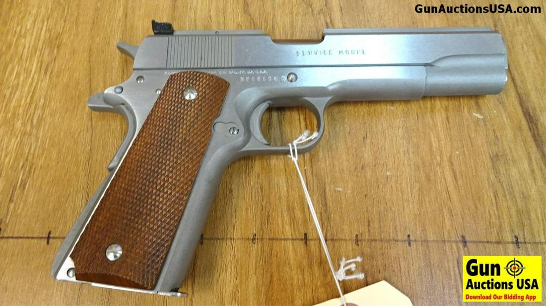 RANDALL SERVICE MODEL ..45 ACP Semi Auto Pistol.: RANDALL SERVICE MODEL ..45 ACP Semi Auto Pistol. Excellent Condition. 5" Barrel. Shiny Bore, Tight Action This All Stainless Steel 1911 Features Polished Flats and Matt Rounds. Target Adjustable Mille