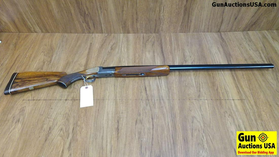 ITHACA TRAP MODEL 12 ga. Single Shot Collector's: ITHACA TRAP MODEL 12 ga. Single Shot Collector's Shotgun. Excellent Condition. 34" Barrel. Shiny Bore, Tight Action This Gorgeous Trap Gun is Manufactured for Ithaca By SKB. Features a 34 Inch Ported