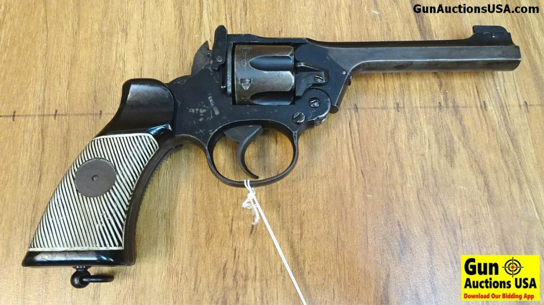 WEBLEY MARK I .38 Cal. Revolver. Very Good. 5" Barrel.: WEBLEY MARK I .38 Cal. Revolver. Very Good. 5" Barrel. Shiny Bore, Tight Action Top Break is Tight, This is a Double Action Only Revolver without Hammer Spur, Lanyard Ring on Butt, Grips have Been Nic