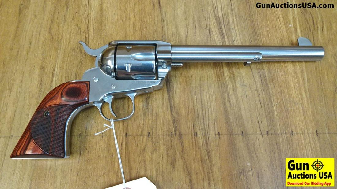 Ruger VAQUERO .45 COLT Revolver. Very Good. 7.5": Ruger VAQUERO .45 COLT Revolver. Very Good. 7.5" Barrel. Shiny Bore, Tight Action Extremely Nice Ruger in High Polished Stainless with Fixed sights, Includes a Bionchi Cyclone Holster, an Additional S