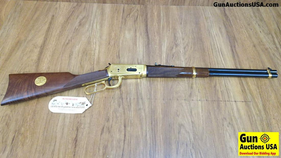 Winchester 94-ANTLERED GAME .30-30 Lever Action: Winchester 94-ANTLERED GAME .30-30 Lever Action Commemorative Rifle. NEW in Box. 20" Barrel. Gold Plated Receiver, Lever and Barrel Bands. Antlered Game Medallion on Right Side of Stock, Stocks are Ni