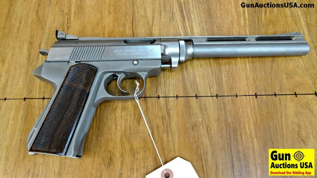 WILDEY FIREARMS AUTO MAG .45 WIN MAG Collector's: WILDEY FIREARMS AUTO MAG .45 WIN MAG Collector's Pistol. Very Good. 10" Barrel. Shiny Bore, Tight Action Everyone has Always Wanted One of These! All Stainless Construction, Full Ventilated Rib Barrel