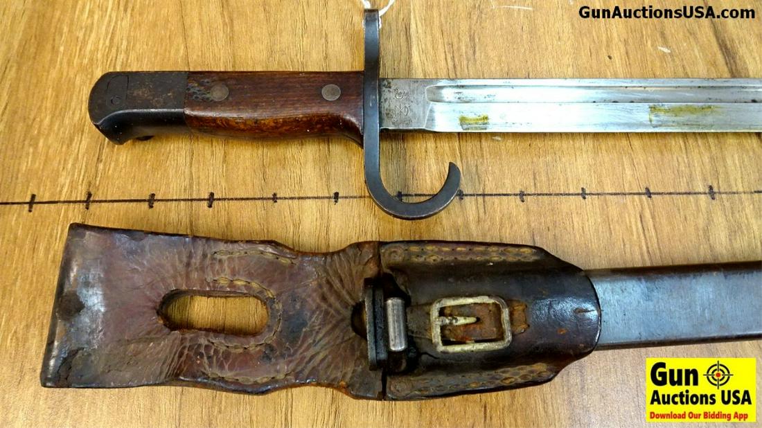 Japanese Bayonet. Very Good. Long Blade with Blood: Japanese Bayonet. Very Good. Long Blade with Blood Groove, Wooden Handle, Steel Scabbard with Leather Frog. . (40356)