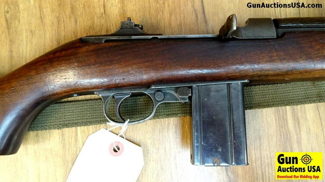 INLAND M1 CARBINE .30 Cal. LOW SN, GMC Rifle: INLAND M1 CARBINE .30 Cal. LOW SERIAL # Rifle. Good Condition. 18" Barrel. Shiny Bore, Tight Action Barrel marked 7-42 General Motors Corporation. Receiver Holds Flip Up to Aperture Sight, Stock is In