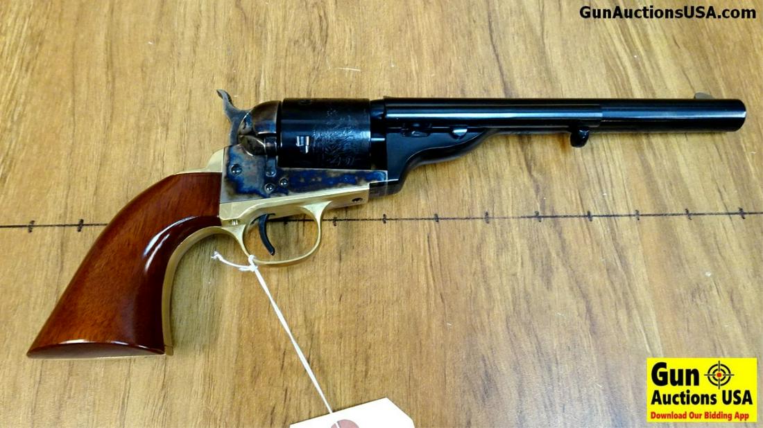 CIMARRON 1872 NAVY .45 Revolver. Excellent Condition.: CIMARRON 1872 NAVY .45 Revolver. Excellent Condition. 7.5" Barrel. Shiny Bore, Tight Action Weapon Appears Unfired, Naval Scene On Cylinder, Beautiful Case Hardened Frame, Brass Handle with Smooth Woo