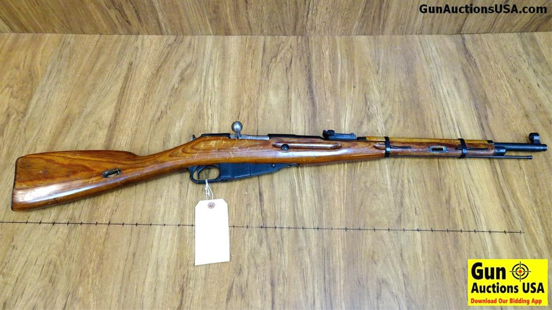 MOSIN-NAGANT M1938 7.62 x 54r Rifle. Good Condition.: MOSIN-NAGANT M1938 7.62 x 54r Rifle. Good Condition. 20" Barrel. Shiny Bore, Tight Action One of the Most Desirable of the Nagants. Rifle Retains Original Cleaning Rod, Iron Sights and Rifle has All m