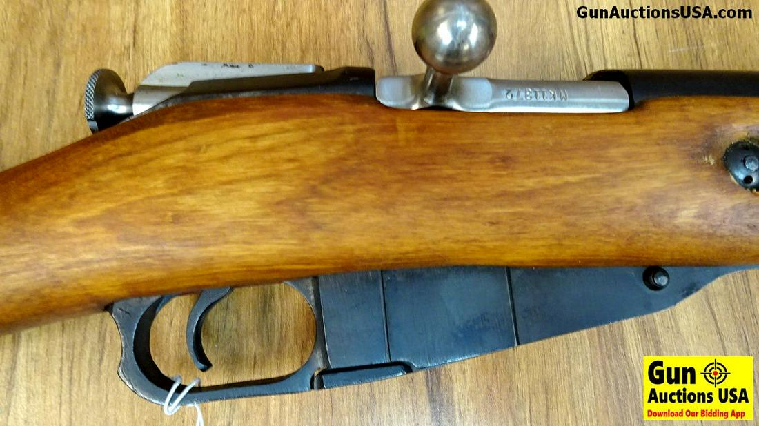 MOSIN-NAGANT T54 7.62 x 39 Rifle. Very Good. 20": MOSIN-NAGANT T54 7.62 x 39 Rifle. Very Good. 20" Barrel. Shiny Bore, Tight Action In Fine Shape for it s Age, Retains its Military Sights, Folding Spike Style Bayonet, Original Cleaning Rod, Dog Eared