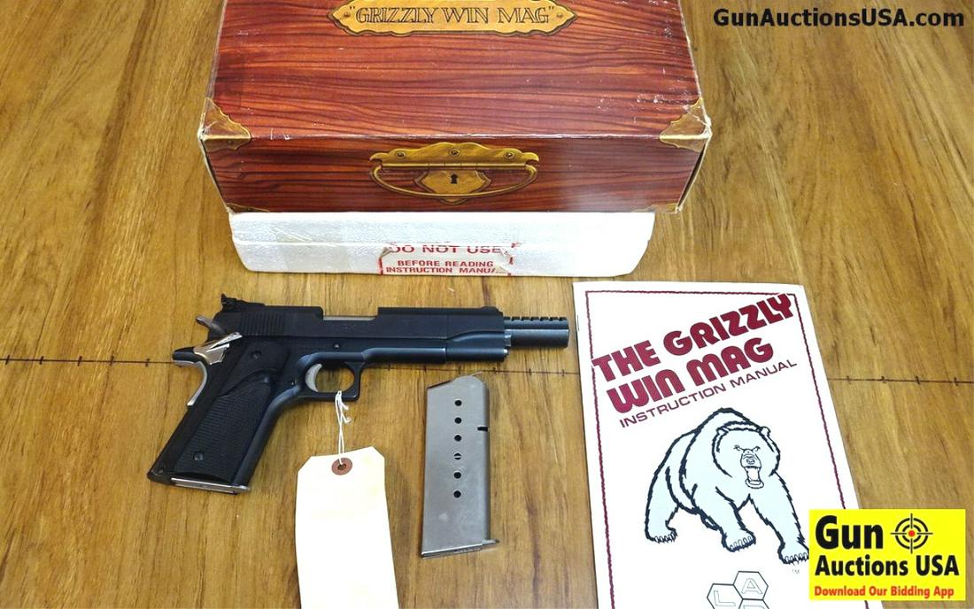 L.A.R. INC GRIZZLY WIN MAG MARK I .45 WIN MAG Pistol.: L.A.R. INC GRIZZLY WIN MAG MARK I .45 WIN MAG Pistol. Excellent Condition. 7" Barrel. Shiny Bore, Tight Action Extremely Powerful and Well Made in a 1911 Style Pistol. Fully Machined Slide with Matt T
