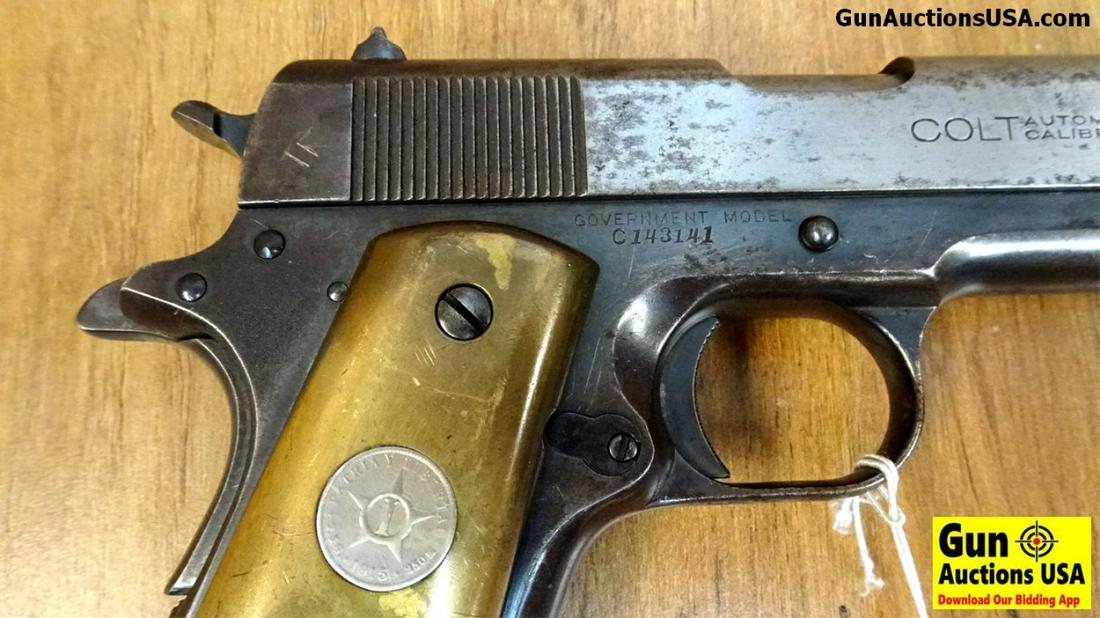 COLT 1911 GOVERNMENT MODEL .45 Pistol Manufactured in: COLT 1911 GOVERNMENT MODEL .45 Pistol Manufactured in 1925. Good Condition. 5" Barrel. Shiny Bore, Tight Action Features Combat Sights, Short Trigger, Government Model Safety, Slide is in the White, G