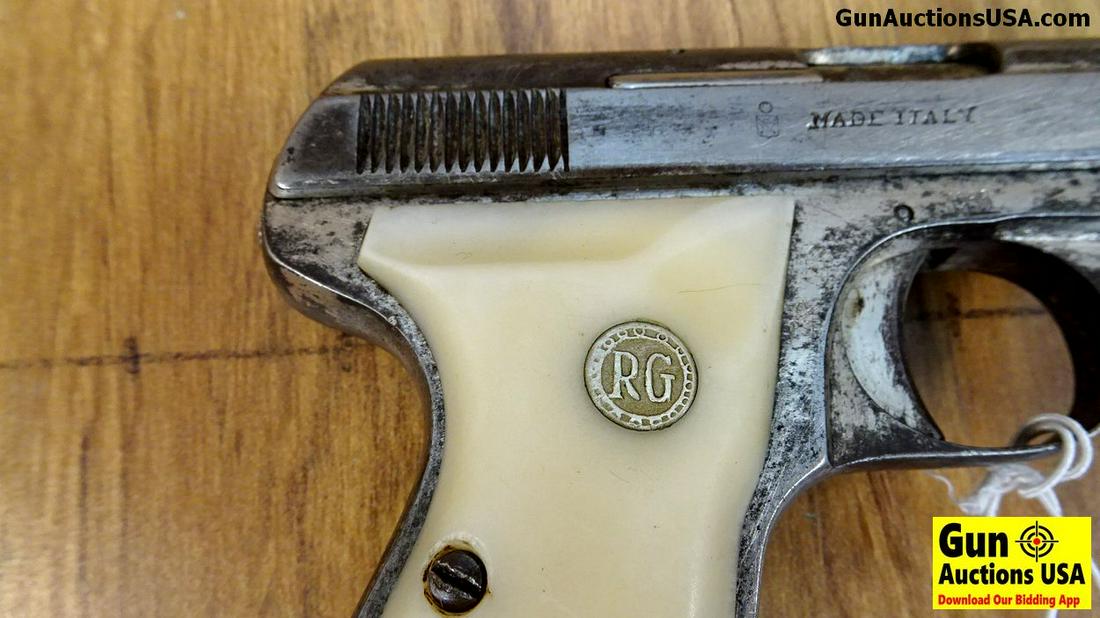 Rino Calesi .25 Pistol. Good Condition. 2" Barrel.: Rino Calesi .25 Pistol. Good Condition. 2" Barrel. Shiny Bore, Tight Action Vest Pocket Size, Italian Made 25 Auto, Finish Mostly Worn But Still Functional, White Grips with Silver Medallions, One Ori