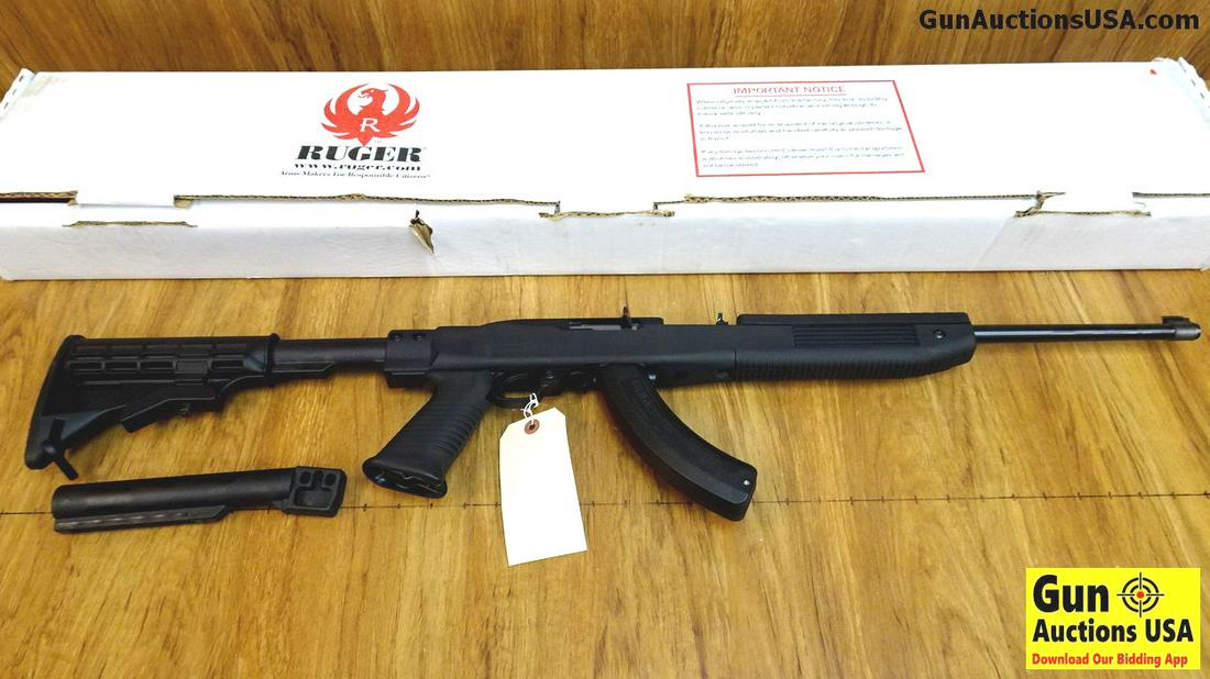 Ruger 10-22 .22 LR TACTICAL Rifle. Like New. 18": Ruger 10-22 .22 LR TACTICAL Rifle. Like New. 18" Barrel. Features a Tapco Stock with Car Configuration and Pistol Grip, Weapon Includes a Optics Rail for Use on the Receiver, Box, Papers and Gun Lock 