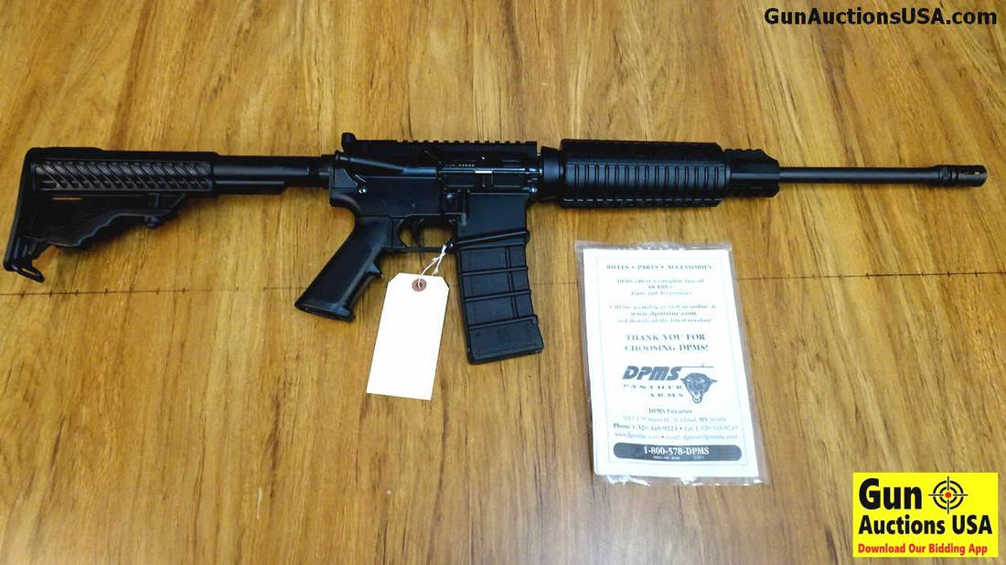 DPMS A-15 5.56 MM Rifle. Excellent Condition. 16.5": DPMS A-15 5.56 MM Rifle. Excellent Condition. 16.5" Barrel. Shiny Bore, Tight Action Optics Ready AR. Features Low Profile Gas Block, Extended Charging Handle, Upper and Lower Match, Carbine is in Car