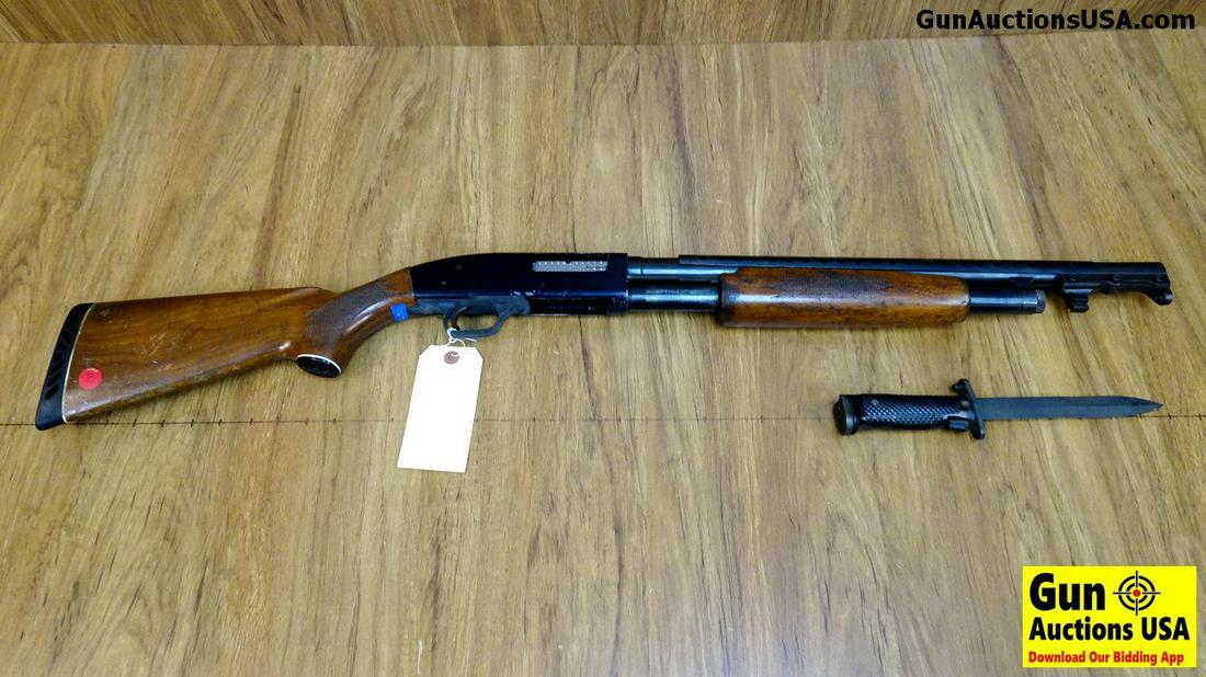 Mossberg 500AB 12 ga. POLICE Shotgun. Good Condition.: Mossberg 500AB 12 ga. POLICE Shotgun. Good Condition. 20" Barrel. Shootable Bore, Tight Action Owner Provenance States that this was a Largo, Florida Police Department Shotgun, With Bayonet, Barrel ha