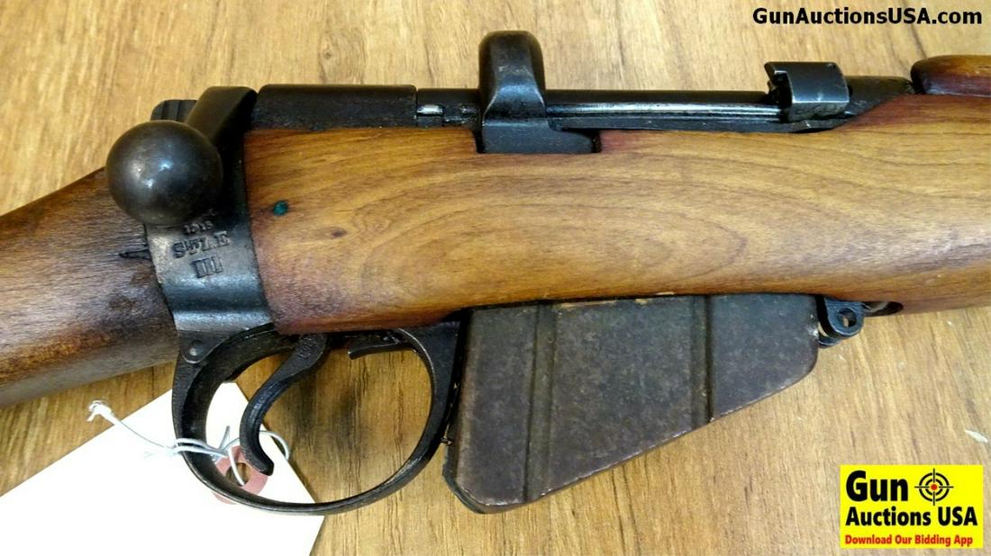 BRITISH ENFIELD 1915 STLR III .303 BRITISH COLLECTOR'S: BRITISH ENFIELD 1915 STLR III .303 BRITISH COLLECTOR'S Rifle. Very Good. 25" Barrel. Shiny Bore, Tight Action This Fine Old War House Retains it Military Iron Sights, Stocks have Been Lightly Sanded B