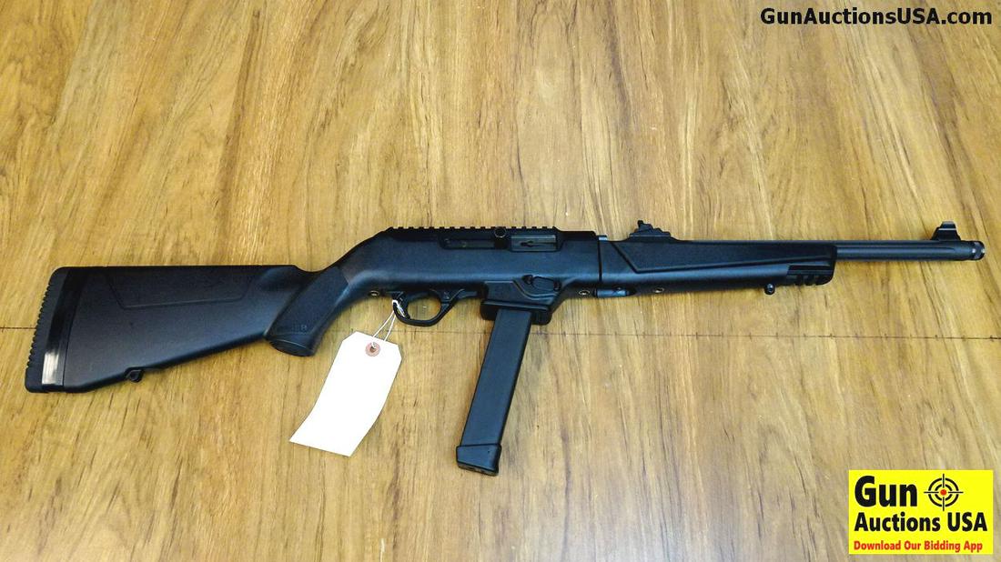 Ruger PC CARBINE 9MM Rifle. Excellent Condition. 16": Ruger PC CARBINE 9MM Rifle. Excellent Condition. 16" Barrel. Shiny Bore, Tight Action This is a Take Down Model, Features Adjustable Peep Sight and Post on a Fluted Barrel that is Suppressor Ready. Bl