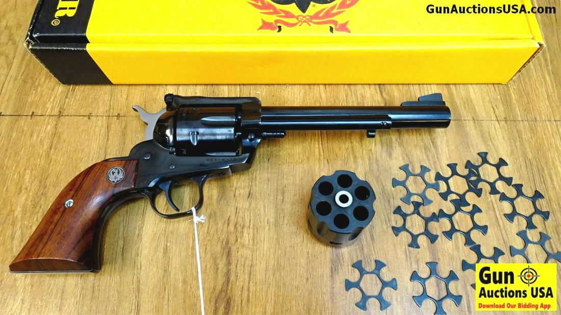 Ruger NEW MODEL BLACKHAWK .38-40/10MM CONVERITBLE: Ruger NEW MODEL BLACKHAWK .38-40/10MM CONVERITBLE Revolver. Like New. 6.5" Barrel. These Convertibles are Hard To Find! The 10 MM Cylinder is in the Weapon and a Additional 34-40 Cylinder is Included 