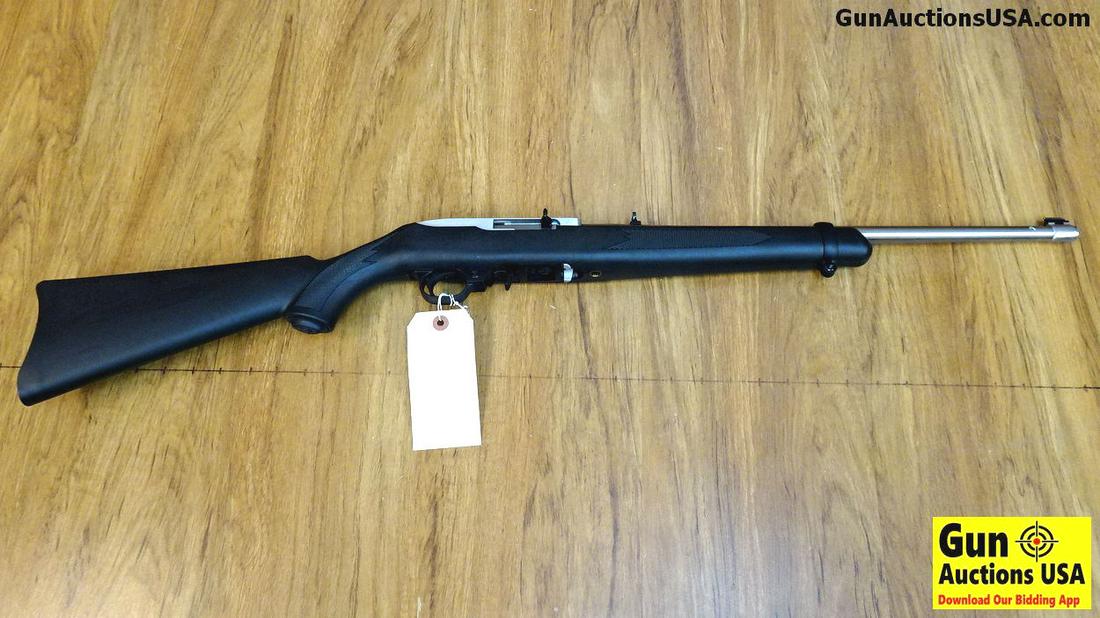 Ruger 10-22 .22 LR Rifle. Excellent Condition. 18": Ruger 10-22 .22 LR Rifle. Excellent Condition. 18" Barrel. Shiny Bore, Tight Action A All Weather 22 with a Stainless Barrel, Aluminum Receiver, Standard 22 Sight system. Receiver is Drilled, Tapped a